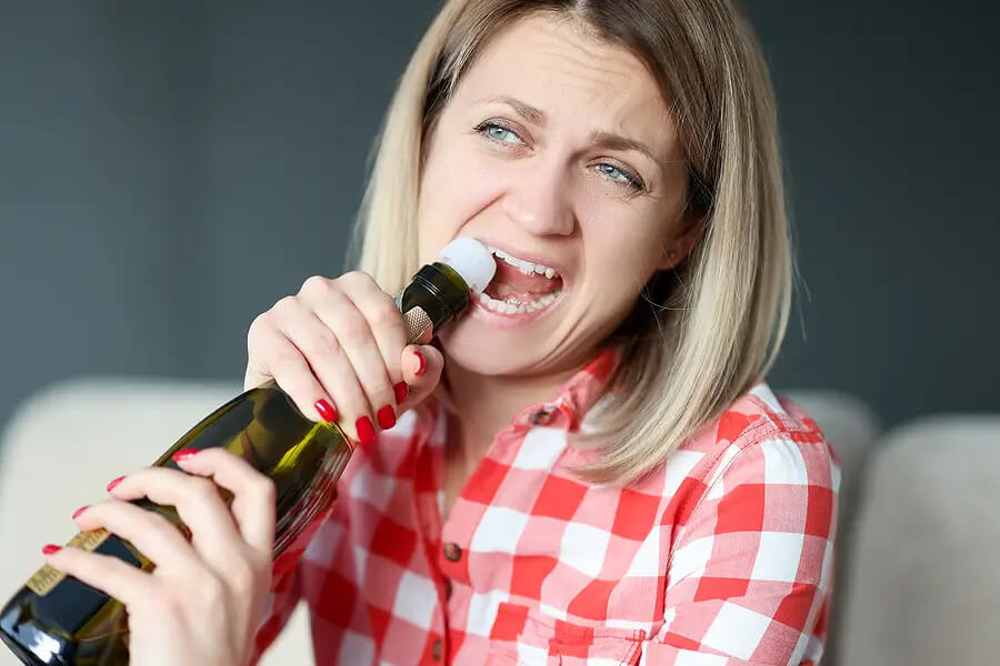 open bottle with teeth